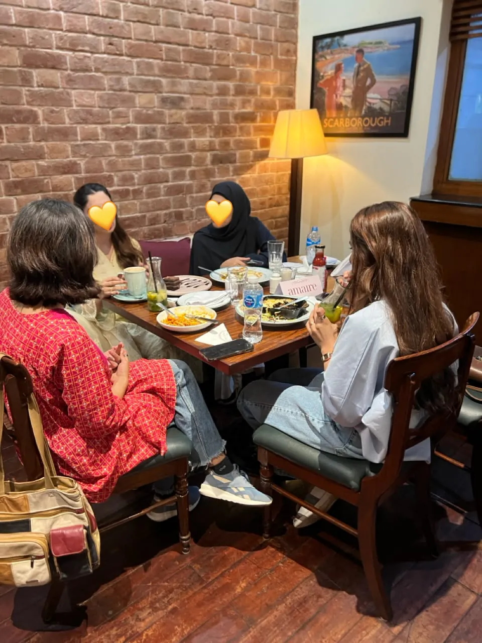 Women sharing conversation over an Amaire dinner